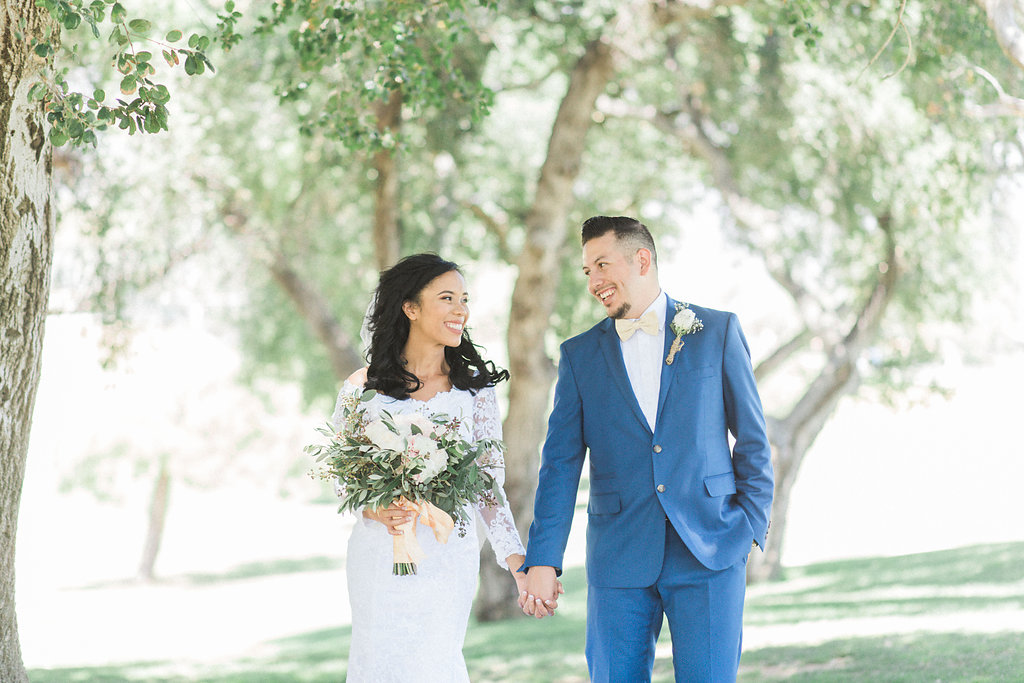 A rustic themed wedding at the Wedgewood Sierra La Verne Country Club by wedding photographer Madison Ellis .